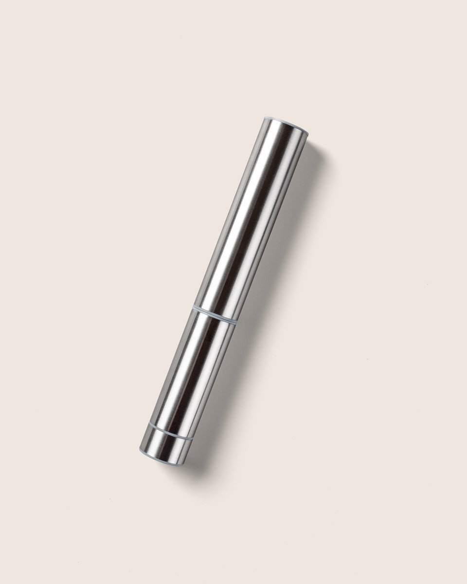 Travel case and storage tube for JOYÀ handheld rechargeable milk frother and blender.