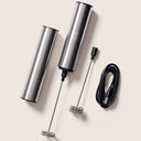 JOYÀ handheld rechargeable milk frother and blender with travel case and USB charging cord.