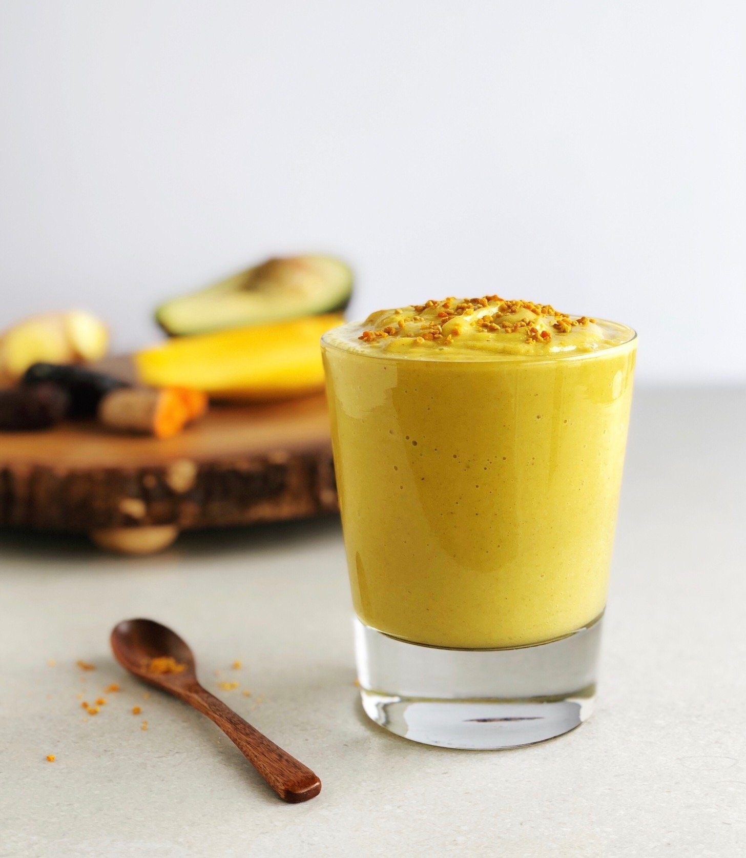 Mango, turmeric and ginger smoothie made with JOYÀ Glow turmeric elixir blend