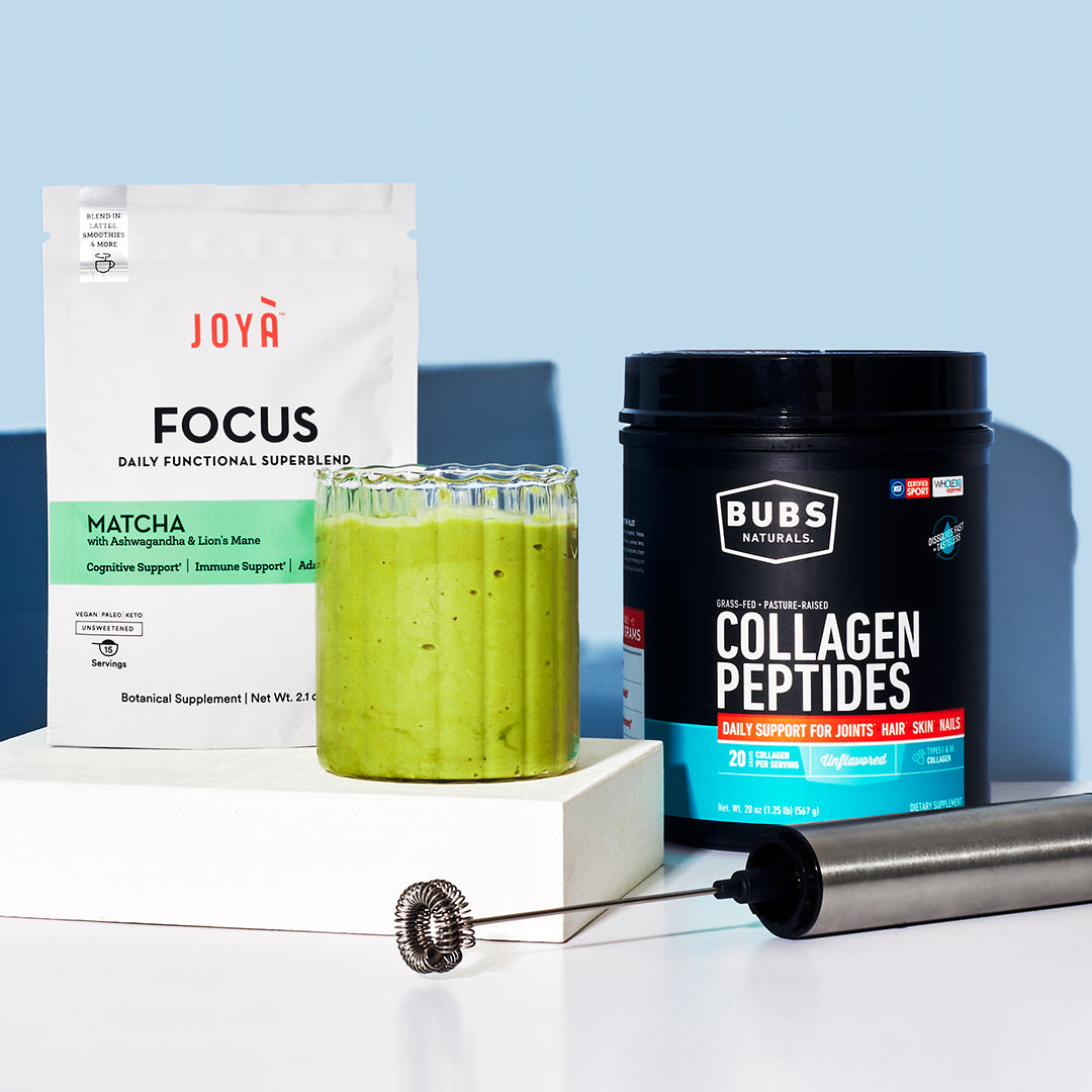 Image of green smoothie featuring JOYÀ's Focus Matcha Superblend, Handheld frother and BUBS Collagen peptides