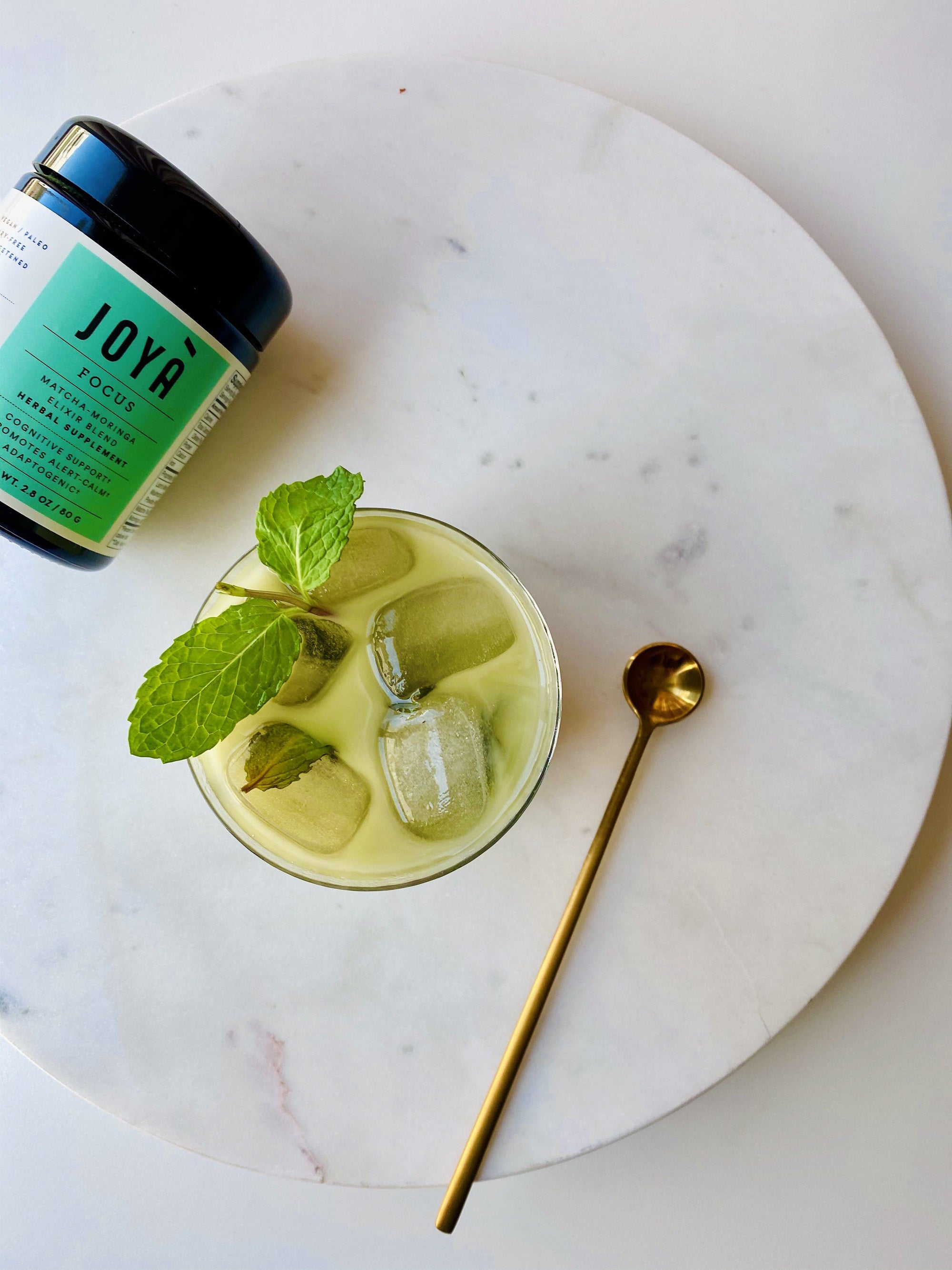 Iced Matcha latte featuring JOYÀ's Matcha-Moringa Elixir Blend