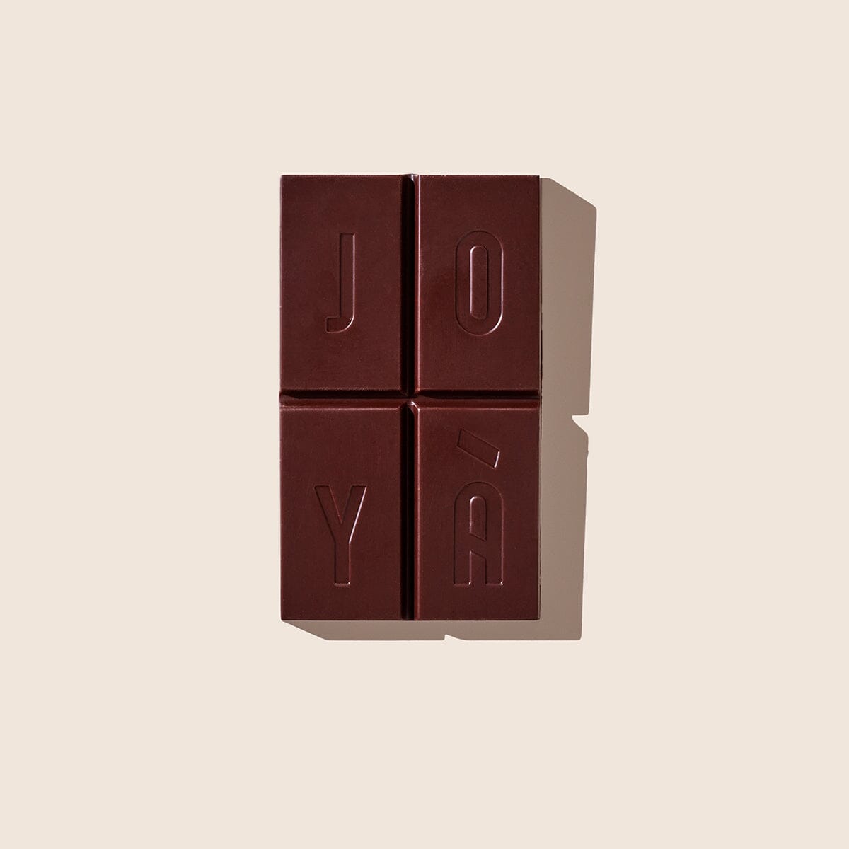 Unwrapped bar of JOYÀ Focus Functional Chocolate

          